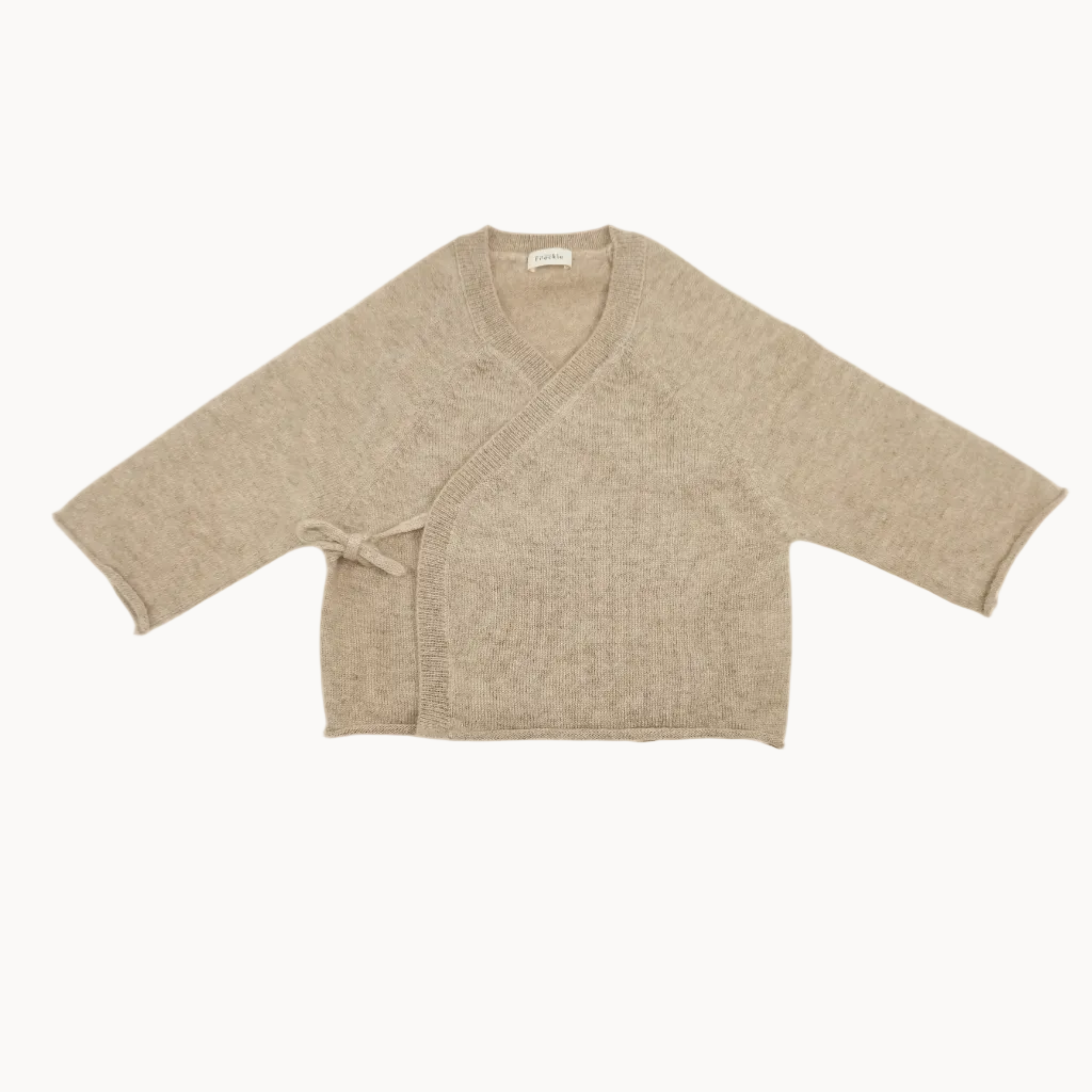 Beige cardigan on a white background