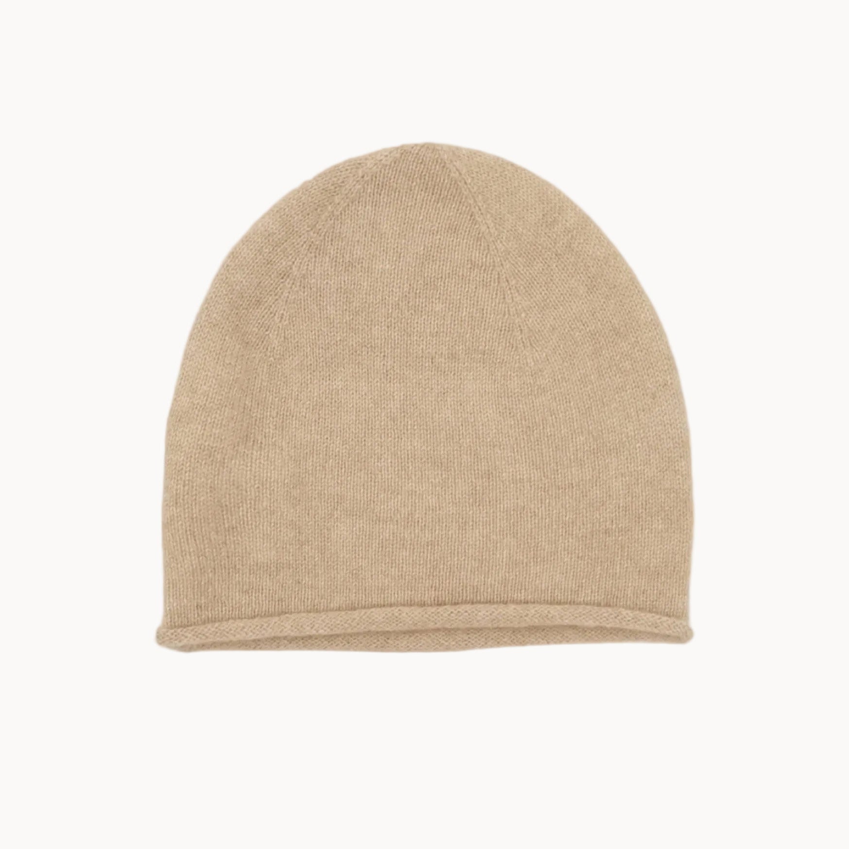Beige knit beanie on a white background